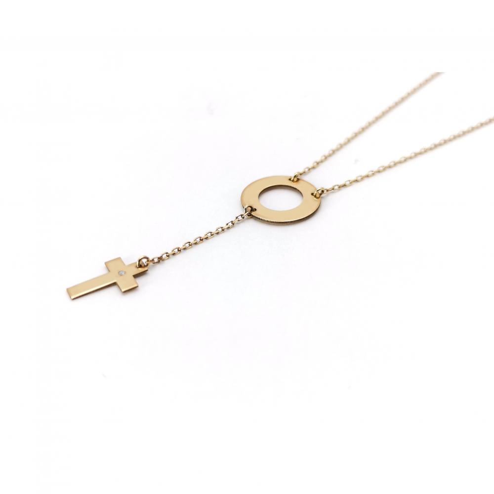 Cross necklace made out of gold and a diamond studded in the center