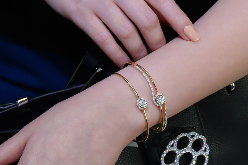 Women wearing a bangle in coronet setting