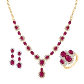 Ruby and diamond jewelry set in yellow gold.