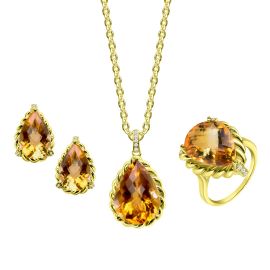 Tear drop shaped citrine and diamond pendant set in yellow gold